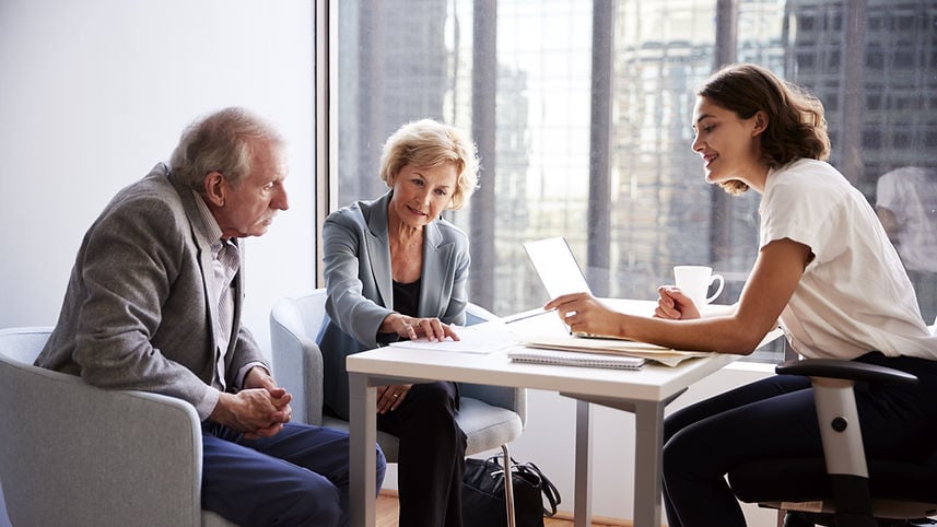 Couple Sitting with Financial Advisor-1